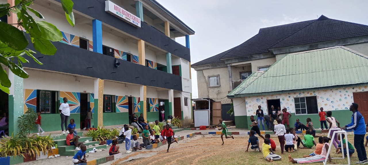 Children playing in the colourful Nursery and Primary playground